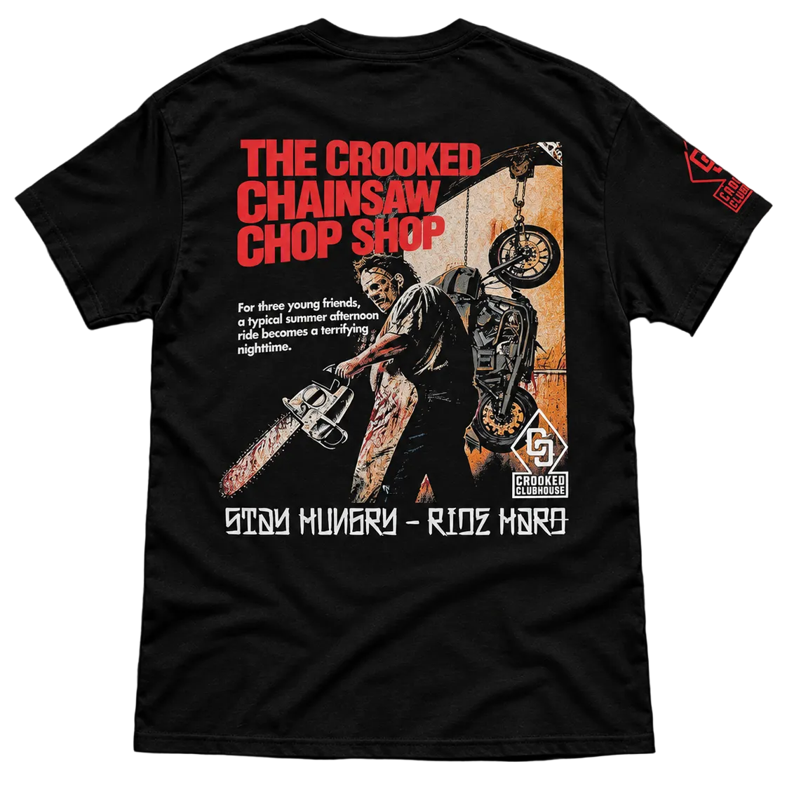 A black short-sleeve graphic T-shirt laid flat on a dark textured background, showing a large back print with red text reading 'THE CROOKED CHAINSAW CHOP SHOP,' an illustrated character holding a chainsaw, and smaller white text reading 'STAY HUNGRY - RIDE HARD.' A small red graphic appears on the left sleeve.